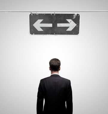 man looking at pointer