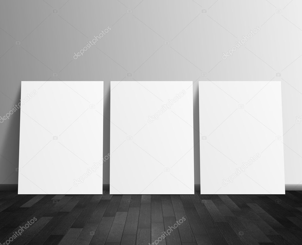 three blank white poster