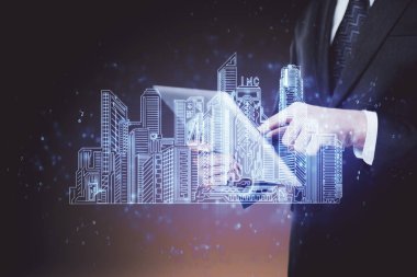 Dijital bir cihaz ve şehir çizimi kullanarak insanın ellerini tutarken çift pozlama.