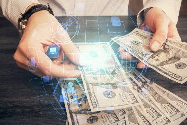 Sosyal ağ temasının çoklu pozlandırılması hologram, Amerikan dolarları ve insan eli.