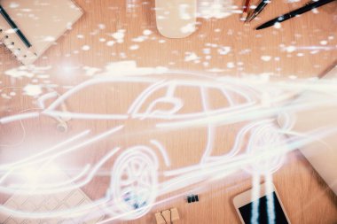 Otomotiv teknolojisi temalı çizimler telefon ile masaya konur. Üst Manzara. Otomatik pilot kavramı.