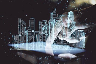 Dijital bir cihaz ve şehir çizimi kullanarak insanın ellerini tutarken çift pozlama.