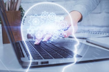 Bilgisayar ve beyin hologramı çizimleri üzerinde çalışan çok sayıda kadın eli var. Ai kavramı.