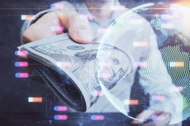 Dünya haritasının iki katına çıkarılması hologram, dolar banknotları ve insan eli..