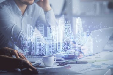 Kadın ve erkeğin birlikte çalışıp hologram çizimlerini çizerken çift pozlama. Akıllı şehir konsepti. Bilgisayar arkaplanı.