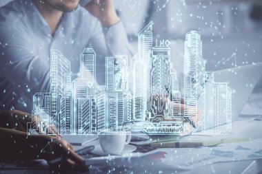 Kadın ve erkeğin birlikte çalışıp hologram çizimlerini çizerken çift pozlama. Akıllı şehir konsepti. Bilgisayar arkaplanı.