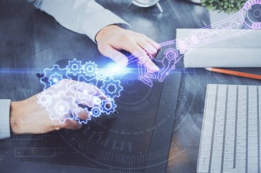 Dijital bir cihaz ve veri temalı çizim kullanan bir adamın el ele tutuşması. Yenilik kavramı.