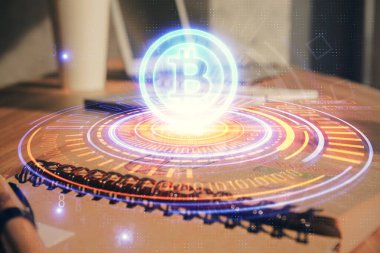 Blockchain temalı çizimler ve açık defter arkaplanı olan bir masa. Kripto para birimi kavramı