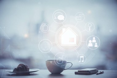 Ofisteki kahve fincanı arka planında binaların hologramını çizerken çift pozlama. Şehir hayatı kavramı