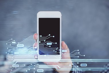 Bir adamın elini tutarken ve dijital bir cihaz ve veri temalı hologram çizimi kullanırken çift pozlama. Teknoloji konsepti.