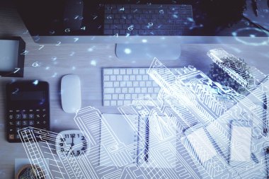 Masaüstü arkaplanındaki bilgisayarın üzerinden şehir çizimi. Üst Manzara. Çifte maruziyet. Akıllı ev kavramı.