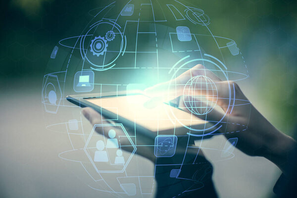 Double exposure of social network sketch hologram and woman holding and using a mobile device.