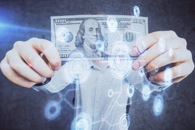 Teknolojinin iki katına çıkması hologram, dolar banknotları ve insan eli. Veri kavramı