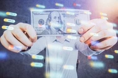 Teknolojinin iki katına çıkması hologram, dolar banknotları ve insan eli. Veri kavramı