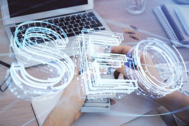 Hologram çizen seonun çoklu pozu ve bize dolar banknotları ve insan eli..