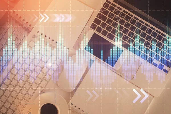 Finans piyasası grafiği ve masaüstü bilgisayarının üst görüntüsü. Çoklu maruz kalma. Yatırım kavramı.