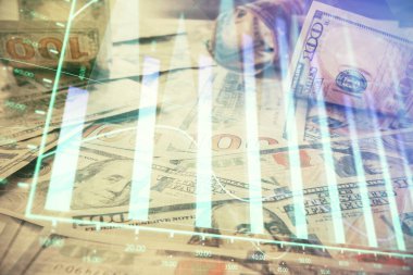 Forx grafiğinin çok sayıda görüntüsü bize dolar banknotları arka planında görünüyor. Finansal başarı piyasası kavramı.