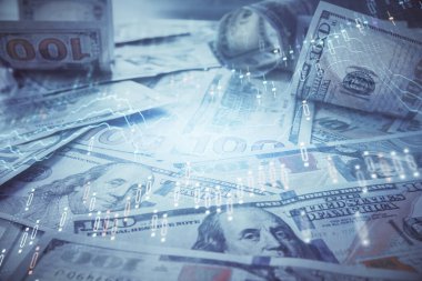 Forx grafiğinin çok sayıda görüntüsü bize dolar banknotları arka planında görünüyor. Finansal başarı piyasası kavramı.
