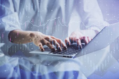 Bilgisayarda ve ön x grafik hologram çiziminde kadın eli yazarken çift pozlama. Borsa yatırım kavramı.