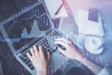 Bilgisayarda ve ön x grafik hologram çiziminde kadın eli yazarken çift pozlama. Borsa yatırım kavramı.