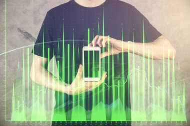 Bir adamın elini tutarken ve dijital bir cihaz ve ön grafik çizimi kullanırken çift pozlama. Finansal piyasa kavramı.