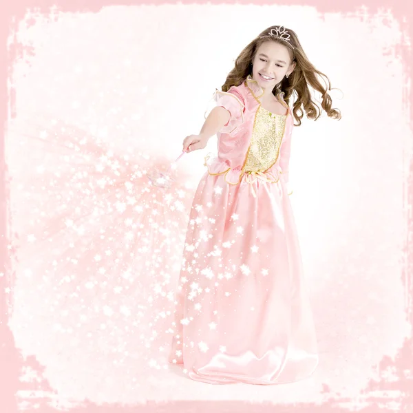 Young girl dressed as a princess with magic wand — Stock Photo, Image