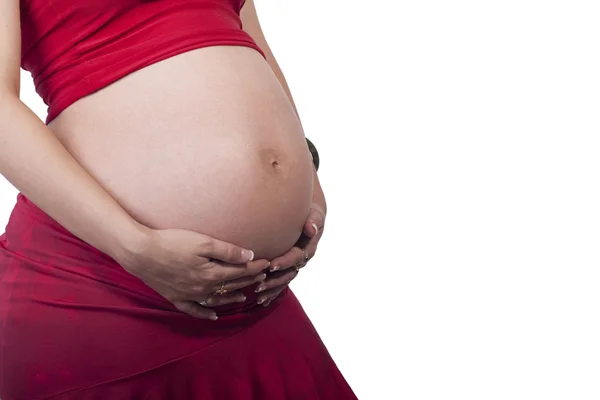 Zwangere vrouw in het rood — Stockfoto