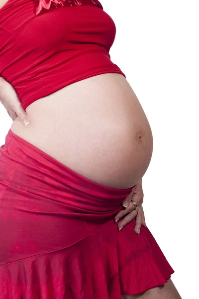 Mujer embarazada en rojo — Foto de Stock