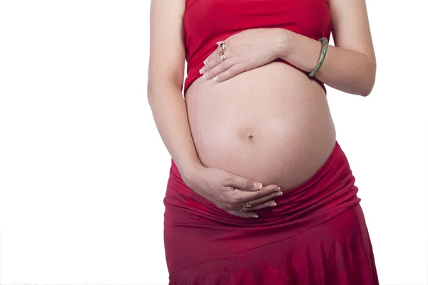 Zwangere vrouw in het rood — Stockfoto