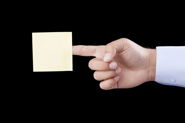 Hand holding blank notepaper — Stock Photo, Image