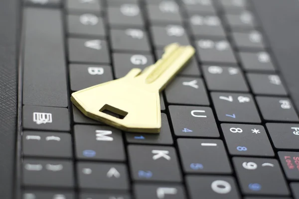 Key and keyboard — Stock Photo, Image