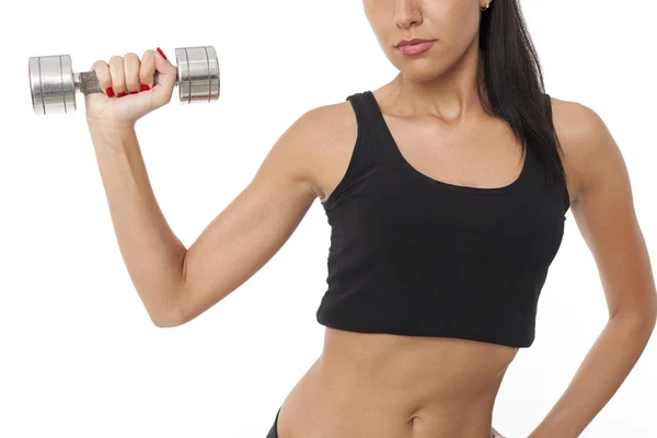 Cuerpo de hembra delgada en ropa deportiva haciendo ejercicio con pesas — Foto de Stock