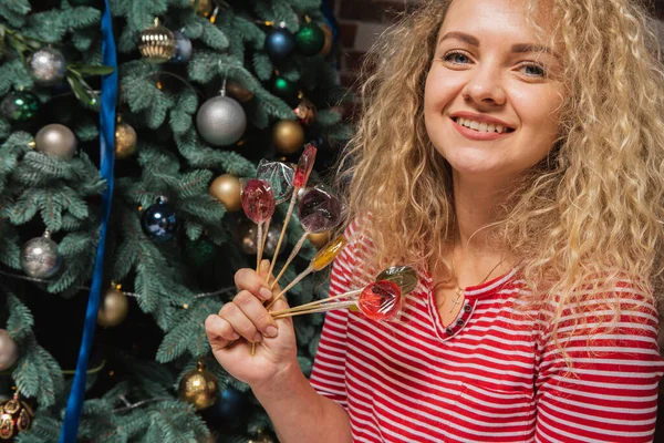 Young Pretty Curly Girl Holding Sweet Lollipops Emotional Smiling Concept — Stockfoto