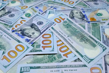 Para için. 100 dolarlık banknotların arkaplanı