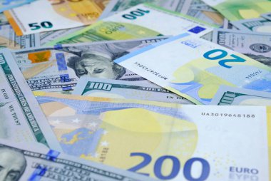 Para için. Euro ve bize dolar banknotları. Dolar ve Avrupa para biriminin geçmişi