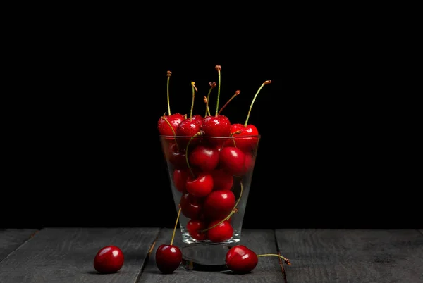 Fresh Cherries Glass Black Wooden Table — Stock Photo, Image