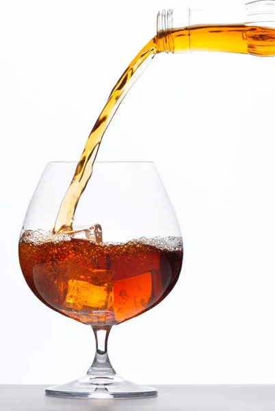 Pouring Whiskey Drink Glass Ice Cubes White Background Stock Photo