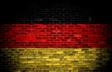 Alman bayrağı üzerinde tuğla.