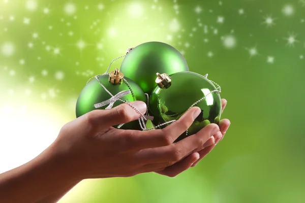 Hand with gift boxes — Stock Photo, Image