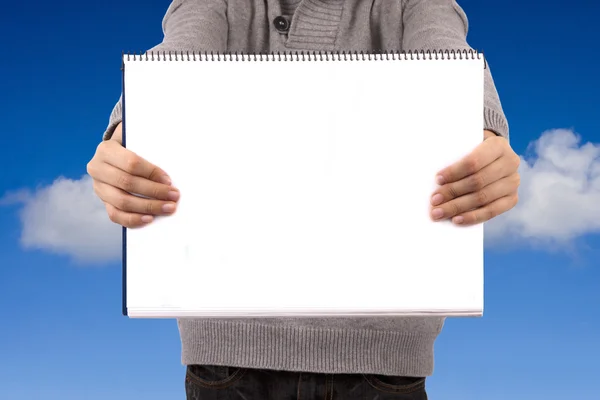 Young adult holding the book or blank sign with — Stock Photo, Image