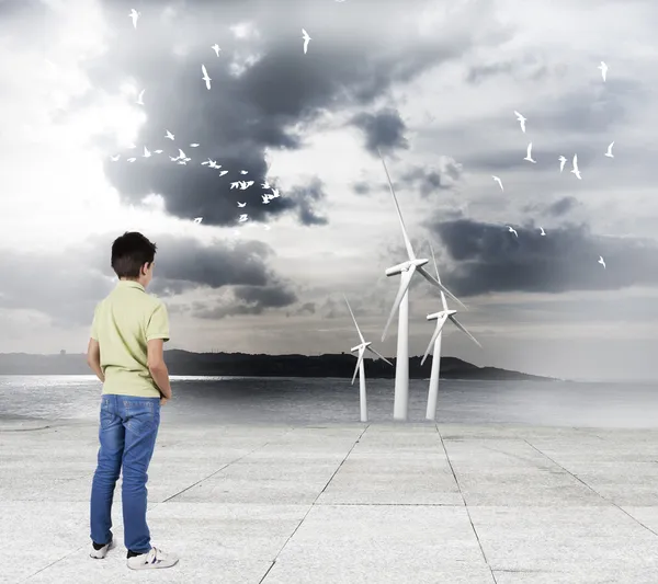 Boy looking to Renewable energy — Stock Photo, Image