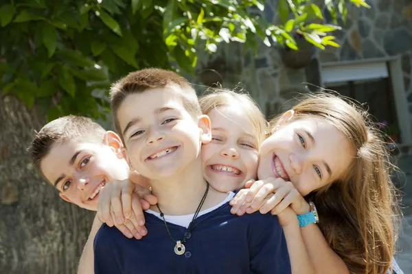 Group of happy children smiling at camera — Stock Photo, Image