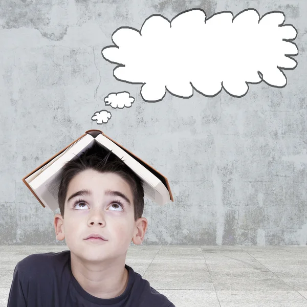 Boy with open book in college thinking — Stock Photo, Image