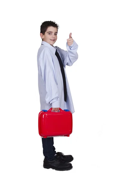 Pojke med slips och vuxen kläder resväska — Stockfoto