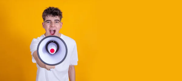 Teenager Boy Megaphone Yelling Isolated Background — Stockfoto