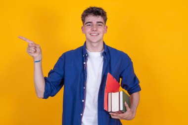 teen boy with books isolated on background clipart