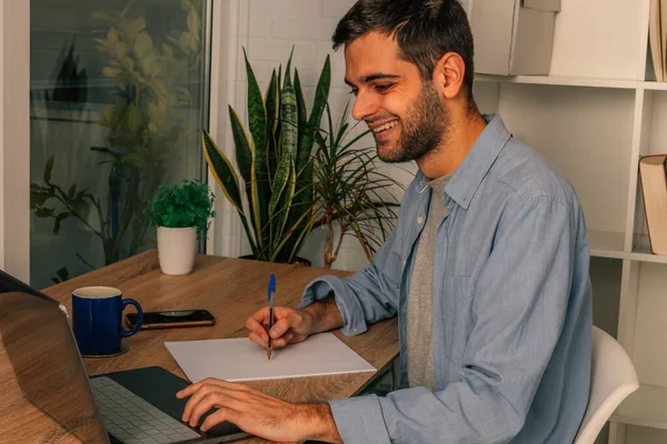 Young Man Home Computer Writing Taking Notes — Stock Photo, Image