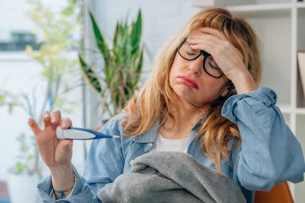 Woman Home Sick Looking Thermometer — Stockfoto