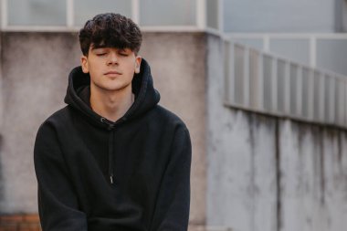 portrait of teenager with closed eyes relaxed
