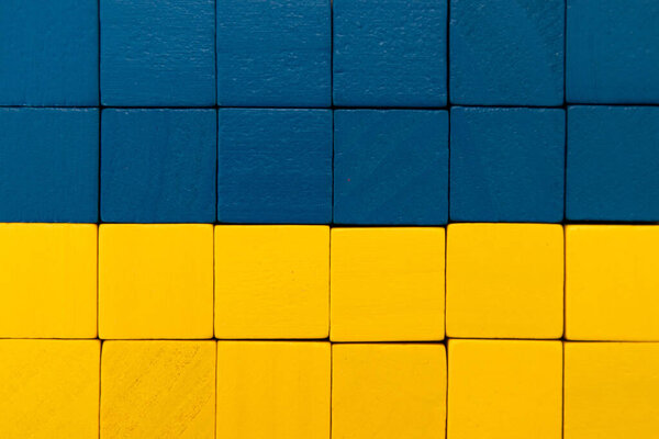 wooden blocks or cubes with the colors of the flag of ukraine